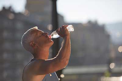 Staying hydrated while working hard.