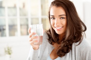 Woman Holding Water Glass