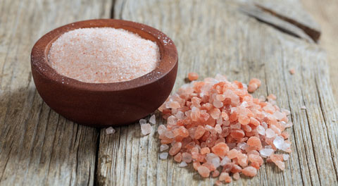 Pink Himalayan salt crystals and powder.